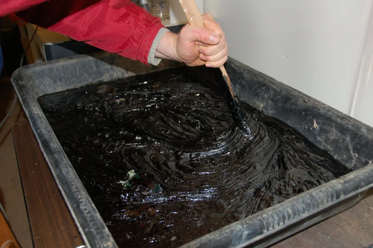 Preparation of petroleum-contaminated soil for treatability study.